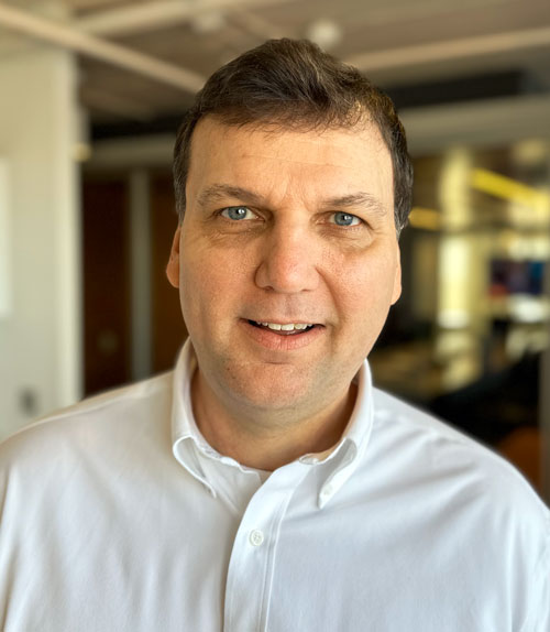 John Fedorek smiling at the camera