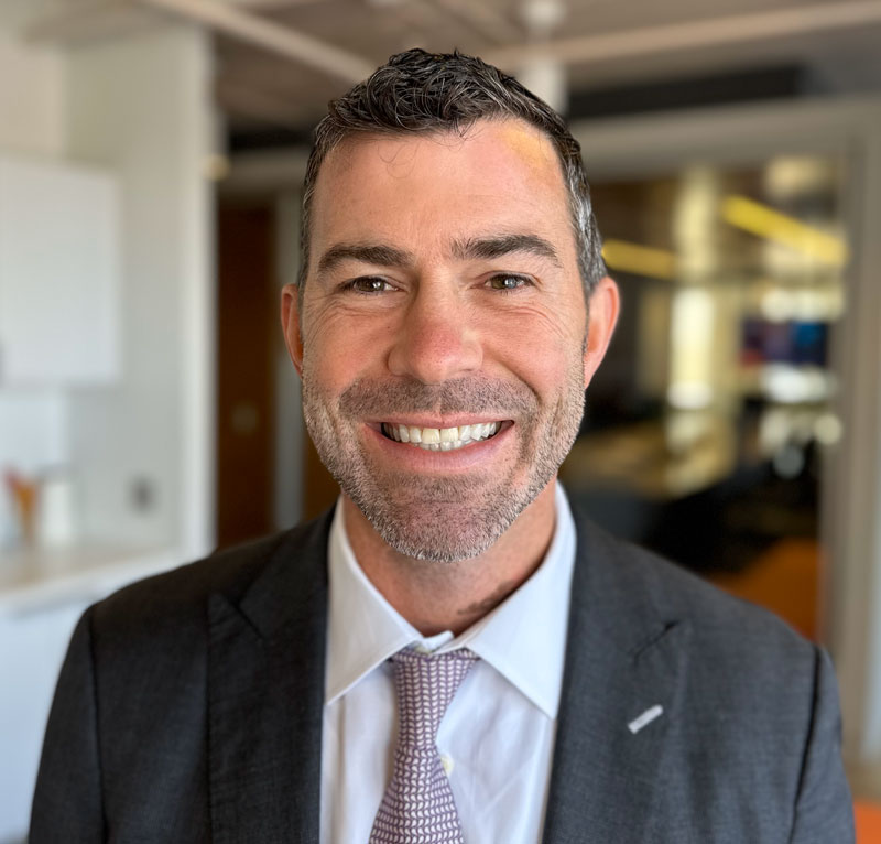 Phil Schmitz headshot smiling