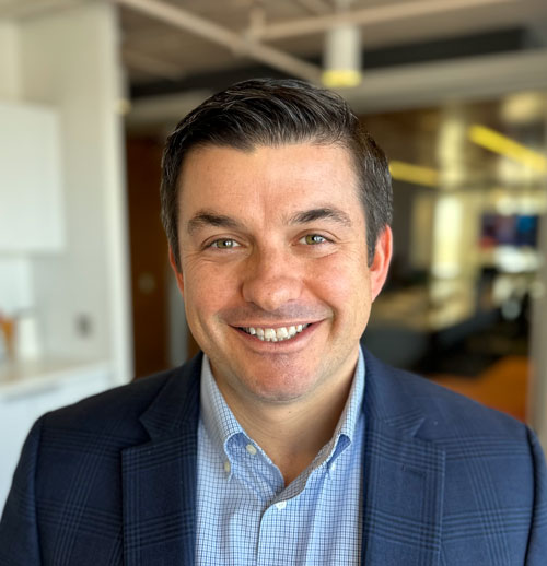 Rhys Mallinger smiling at the camera